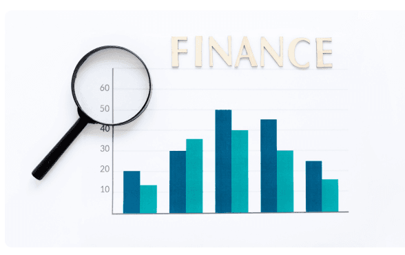 Magnifying glass over a bar chart beneath the word Finance
