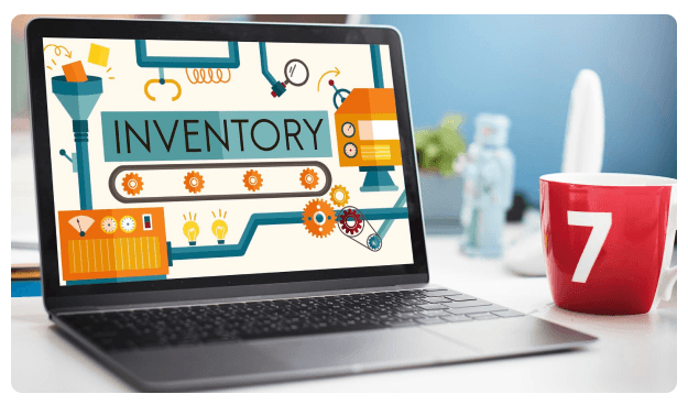 Laptop screen showing an 'Inventory' infographic beside a red mug on a desk