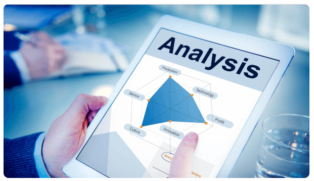 Hand pointing at an analysis radar chart on a tablet