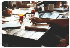 Team collaborating around a table